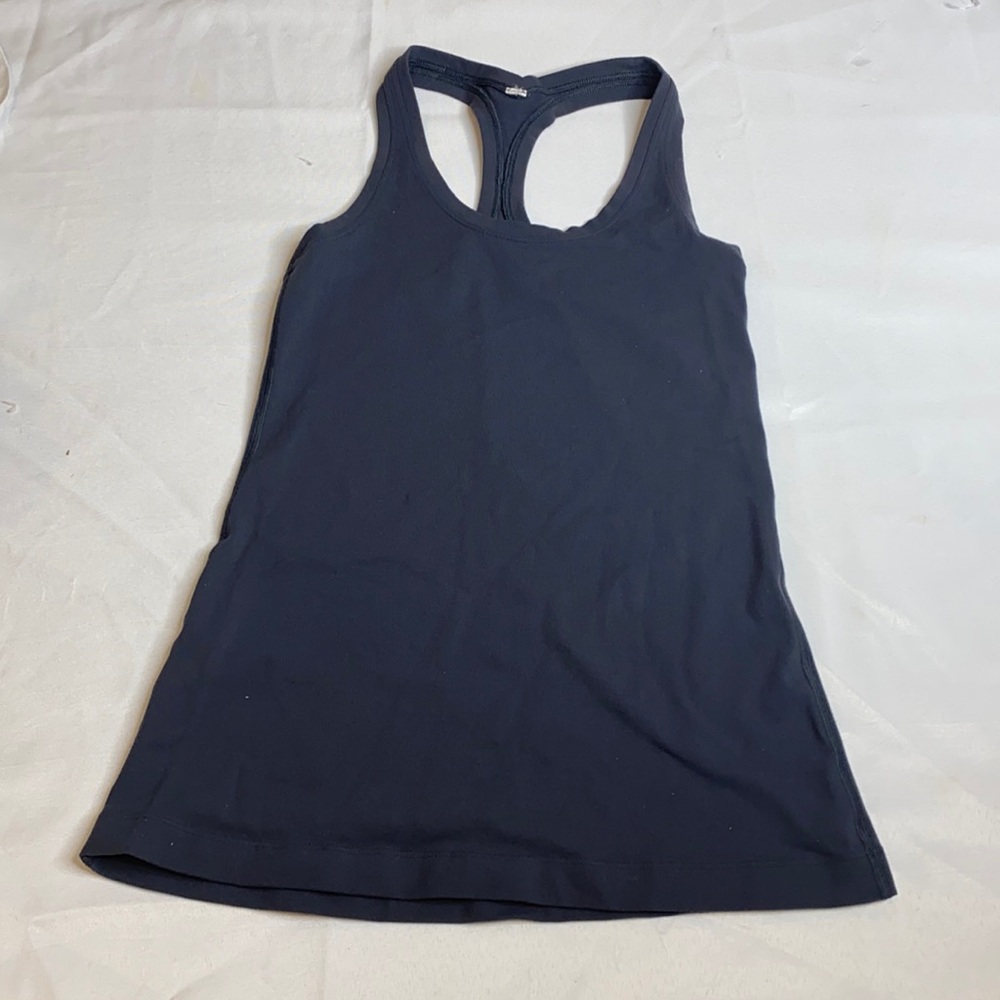 4 shirt bundle includes 2Lululemon shirts & 2 nike